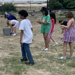 campers playing with water balloons