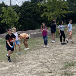 campers playing with water balloons