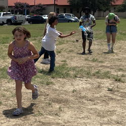 campers playing with water balloons