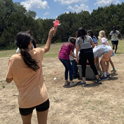 campers playing with water balloons