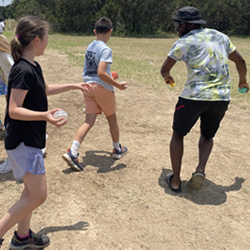 campers playing with water balloons