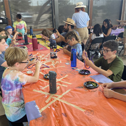 campers making bead animals