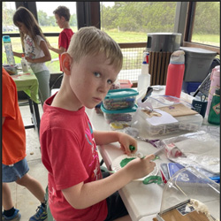 camper making aquatic animal