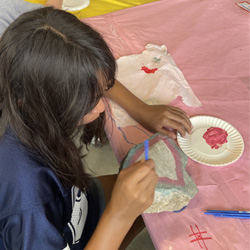 camper painting rock