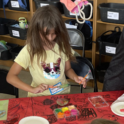 camper painting rock