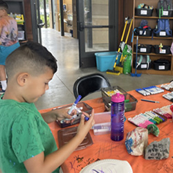 camper painting rock