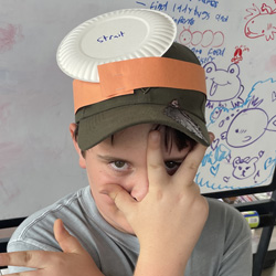 camper with Strait paper plate on head