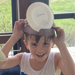 camper with Brem paper plate on head