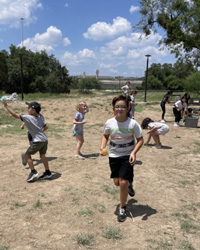 campers playing with water balloons