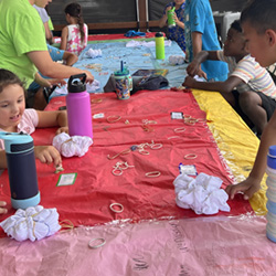 campers making tie-dye shirts