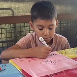 camper doing word activity