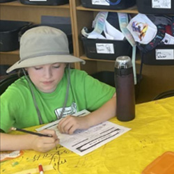 camper doing word activity