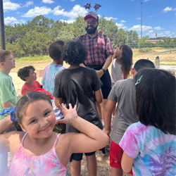 campers playing with water balloons