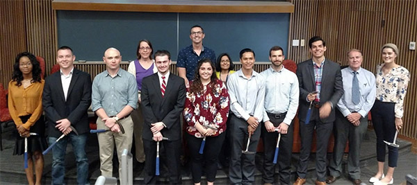 group photo of students at the symposium