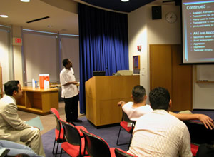 Yonas Keleta presenting to audience