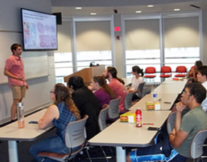 students listening to a presentation