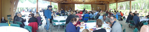 people sitting at event tables