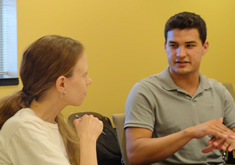 students seated at conference table