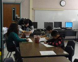 students planting pots