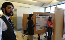 participants looking at posters