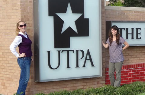 Anna Boeck and Jewell Cozort by UTPA sign