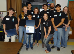 student receiving certificate