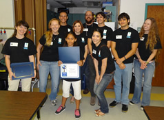 student receiving certificate