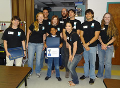 student receiving certificate