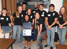 student receiving certificate