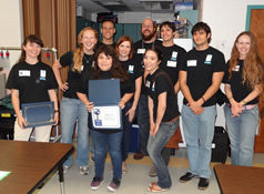 student receiving certificate