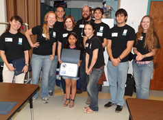 student receiving certificate