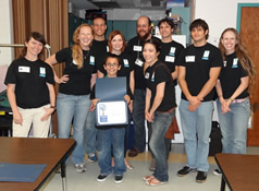 student receiving certificate