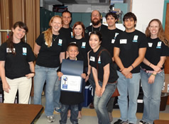 student receiving certificate