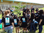 students and tree planting